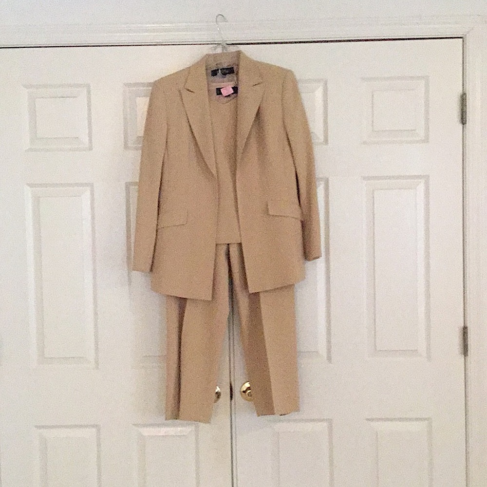 Tan-dark cream 3 piece suit can be worn with or without vest. Suit is lined